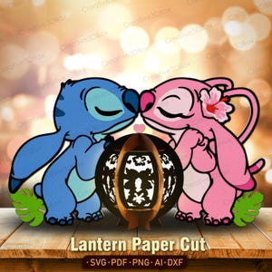 May include: A paper cut design featuring the characters Stitch and Angel kissing, with a decorative lantern in the center. The lantern is brown with a black cutout design. The text "Lantern Paper Cut" is at the bottom.