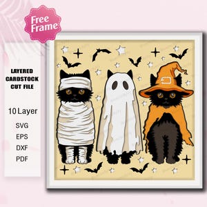 May include: A layered cardstock cut file featuring three black cats dressed in Halloween costumes: a mummy, a ghost, and a witch. The image includes bats, stars, and crosses on a light yellow background. The text "LAYERED CARDSTOCK CUT FILE" is visible.