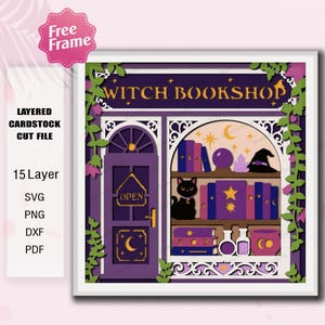 May include: A layered cardstock cut file featuring a purple witch bookshop storefront with a black cat, books, a crystal ball, and a witch hat on shelves. The sign reads WITCH BOOKSHOP and OPEN. The design includes green vines and gold accents.