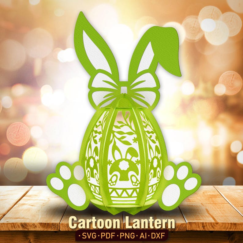 Pu&ograve; includere: Una lanterna di Pasqua a forma di coniglio verde e bianco con un motivo floreale. La lanterna ha la forma di un uovo e ha un fiocco in cima. La lanterna &egrave; fatta di carta ed &egrave; progettata per essere ritagliata e assemblata.
