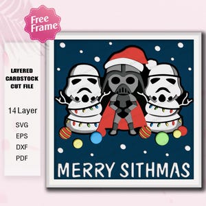Könnte beinhalten: Ein mehrschichtiges Karton-Schnittdateidesign mit Darth Vader mit Weihnachtsmütze und zwei Sturmtruppen, alle mit Lichterketten geschmückt. Der Satz "MERRY SITHMAS" wird auf einem marineblauen Hintergrund mit weißen Punkten angezeigt.
