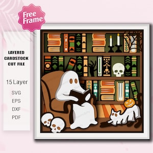 May include: A layered cardstock cut file featuring a Halloween-themed scene. A ghost reads a book in a chair, with a cat, skulls, and a pumpkin. The background shows a bookshelf with books, candles, and a skull. The image includes the text "Free Frame".