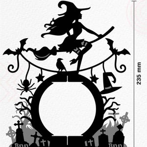 May include: Black silhouette of a witch flying on a broomstick with bats, a spider, a raven, and a graveyard in the background. The witch is flying over a black circle with the words "Boo" on either side. The circle is 8 inches in diameter and the overall height of the design is 9.25 inches.