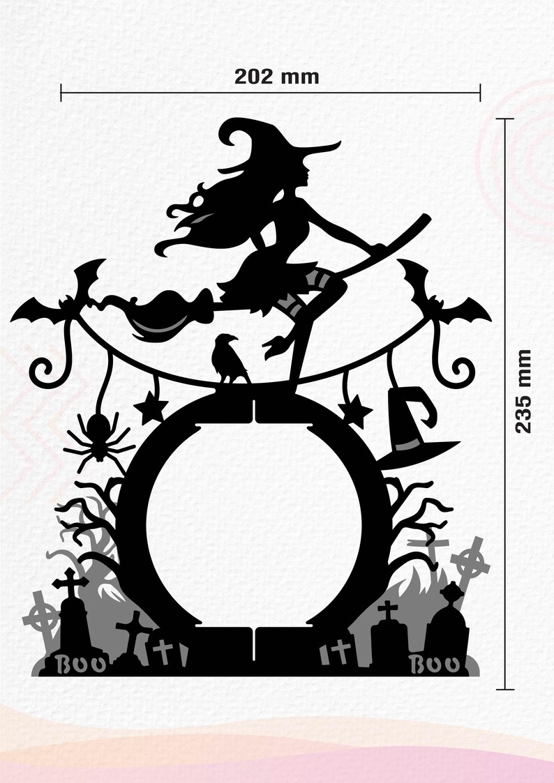 May include: Black silhouette of a witch flying on a broomstick with bats, a spider, a raven, and a graveyard in the background. The witch is flying over a black circle with the words "Boo" on either side. The circle is 8 inches in diameter and the overall height of the design is 9.25 inches.