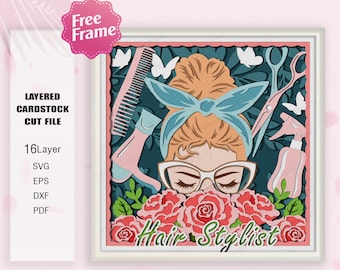 May include: A layered papercraft design featuring a woman with a blue headband and glasses, surrounded by roses and hair styling tools. The text "Hair Stylist" is written below the image.