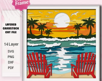 May include: Layered cardstock cut file depicting a beach scene with a sunset, palm trees, and two red Adirondack chairs. The design has 14 layers and is available in SVG, PNG, DXF, and PDF formats. The image is framed in white.