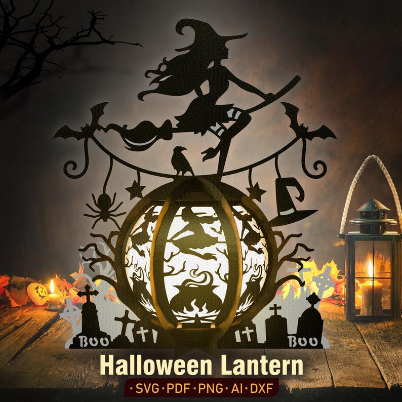 May include: A black metal Halloween lantern shaped like a pumpkin with a witch flying on a broomstick, bats, and a raven. The lantern has a white light inside and the words "BOO" on the bottom.