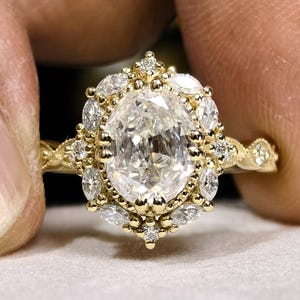Oval Moissanite Halo Engagement Ring: 14K Yellow Gold Vintage Floral Design
