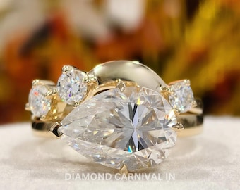 Set di anelli nuziali in moissanite taglio a pera da 4 carati: incastonatura est-ovest con alone nascosto