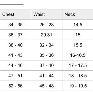 May include: A size chart for tops, with measurements in inches. The chart includes sizes XS to 3XL, listing chest, waist, neck, and arm length measurements. The text "Tops" is at the top of the image.