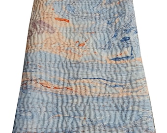 May include: A blue and orange kantha quilt with a marbled pattern. The quilt is made of cotton and has a soft, quilted texture.