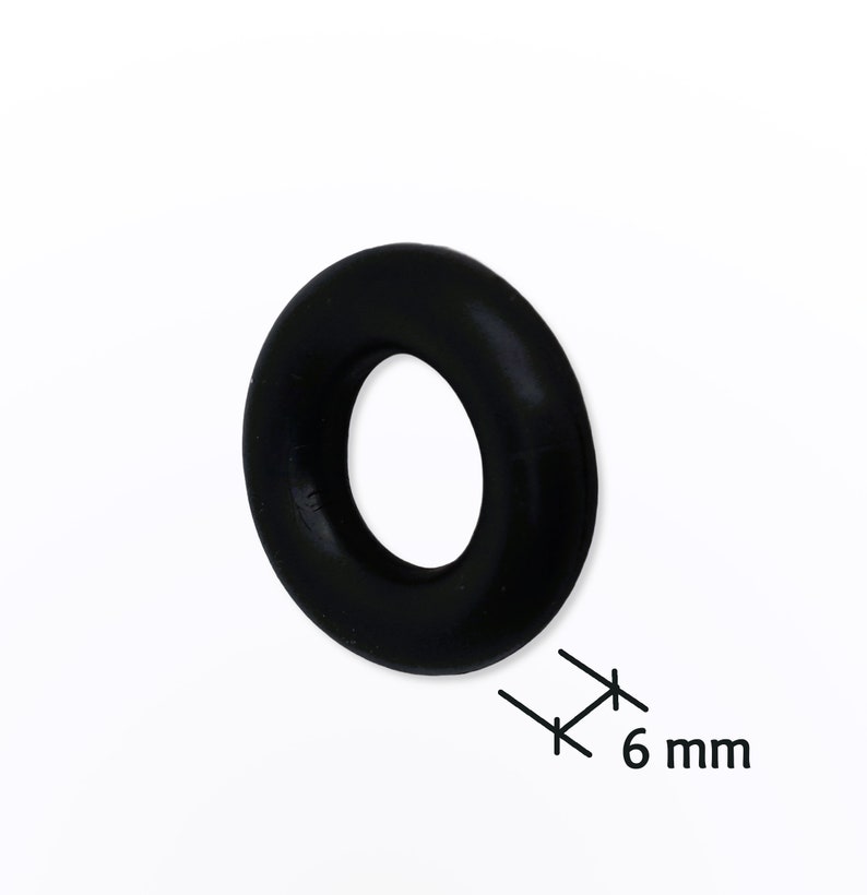 May include: A black rubber O-ring with a 6 mm inner diameter.