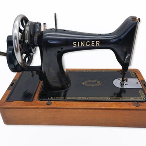 Máquina de coser con manivela Singer Eye Pattern Año 1954 Modelo 99K con accesorios imagen 5
