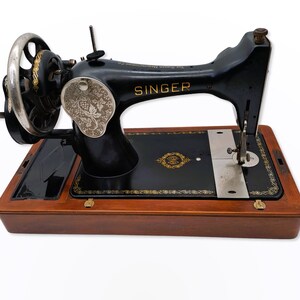 Singer Model 128 Hand Crank Sewing Machine from 1937 with Accessories and Wooden Cover image 2