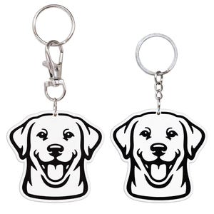 May include: Two keychains featuring a smiling dog face in black and white. The dog's head is outlined in black, with a white interior. Each keychain has a silver metal ring and clasp for attaching to keys or bags.