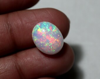 7.5 Cts Natural AAA+ Grade Flashy Fire Solid Ethiopian Opal Oval Shape Cabochon, 14.9x11.9x7.5MM Red Green Yellow Blue Color Play White Opal