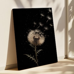 Puede incluir: Un lienzo rectangular que presenta un fondo negro de alto contraste con un diente de león en semilla. Las semillas blancas y plumosas se muestran flotando hacia arriba y hacia afuera desde la cabeza de la flor, creando un efecto delicado.