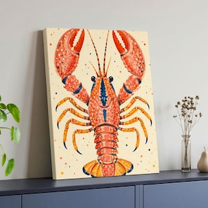 May include: A rectangular canvas print featuring a vibrant illustration of a lobster centered on a cream-colored background. The lobster is depicted in shades of orange, red, and blue, with detailed textures and small dots scattered across the surface.