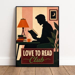 May include: A rectangular wall art print featuring a silhouette of a person reading a book at a table with a lamp, a stack of books, and a mug. The background has vertical stripes in peach and cream. The text reads LOVE TO READ Club in white and green.
