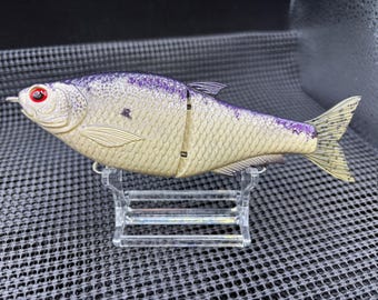 6.3'' Hinkle Shad K.O. in a Bone/Purple pattern
