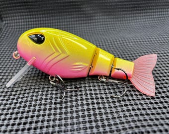 5 in 1.6oz Wake N Crank wake bait in my Raspberry Lemonade pattern