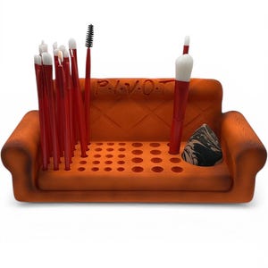 May include: A set of three ceramic mugs with a speckled, matte finish. The mugs are in shades of cream, light gray, and dark gray. Each mug has a simple, minimalist design, perfect for coffee or tea.