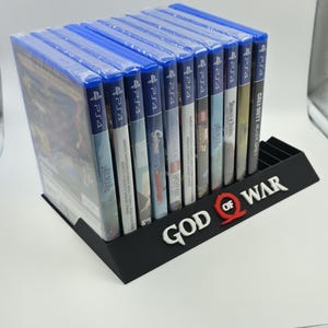 Expositor 10,12,14,15 Juegos Logo God Of War PS2,PS3,PS4,PS5