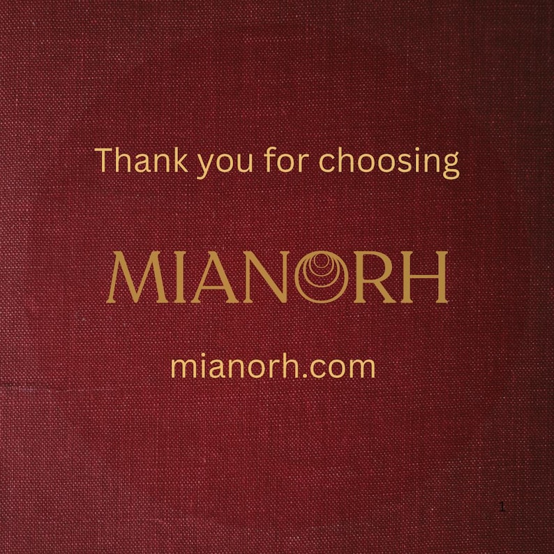 May include: A dark red textured card featuring the gold text Thank you for choosing MIANORH and the website mianorh.com. The letter O in the brand name is replaced by a series of concentric circles. The background has a visible fabric-like weave.