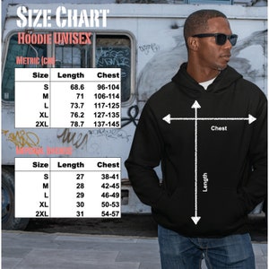May include: Size chart for a unisex hoodie in black. The chart shows measurements in both inches and centimeters for sizes S, M, L, XL, and 2XL. The chart shows the length and chest measurements for each size.