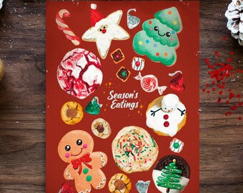 Könnte beinhalten: Ein roter Hintergrund mit einer Vielzahl von Weihnachtskeksen, darunter ein Lebkuchenmann, ein Schneemann, ein Stern, ein Baum und ein Zuckerstange. Der Text "Season's Eatings" ist in Weiß auf einem roten Banner geschrieben.