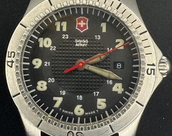 Vintage Victorinox Swiss Army Mens Watch : Odyssey 38MM Swiss Stainless Working