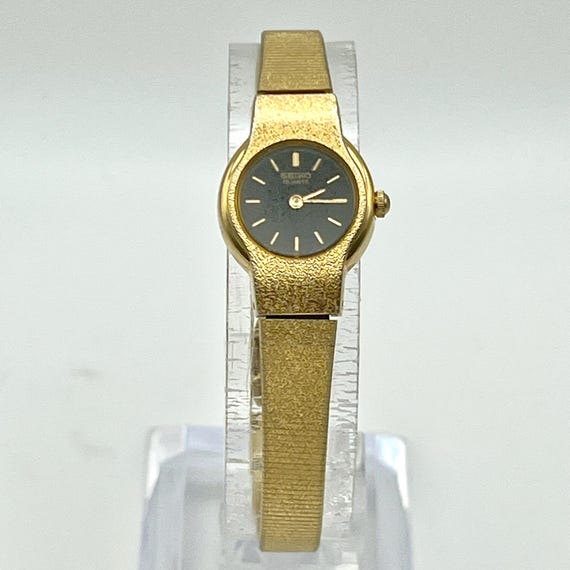 Seiko gold and black sale
