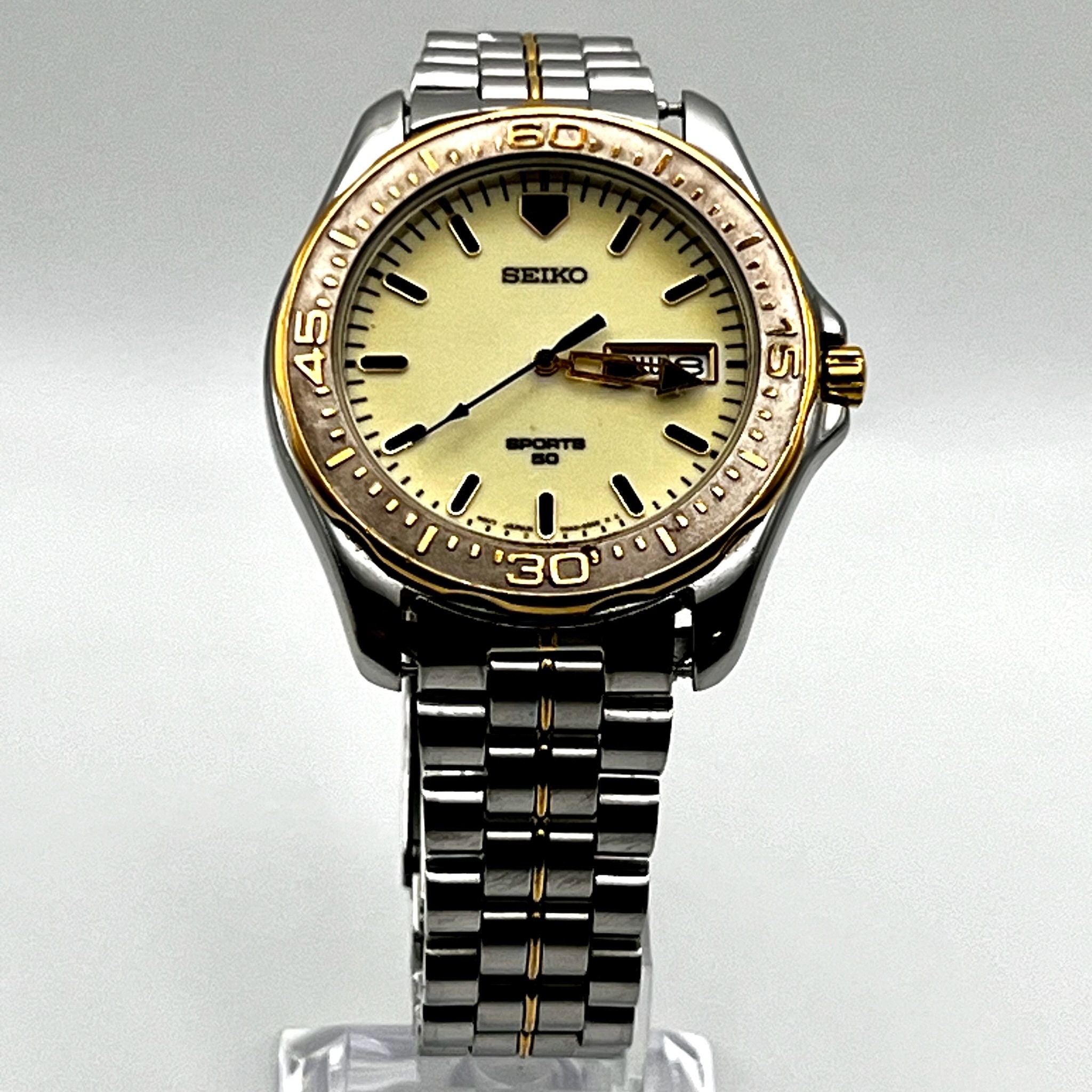 Seiko Vintage 1990's Sports 50 Mens Round Gold Silver and Seiko Vintage 1990's Sports 50 Mens Round Gold Silver and