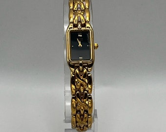 Petite montre femme vintage rectangulaire plissée en or Citizen