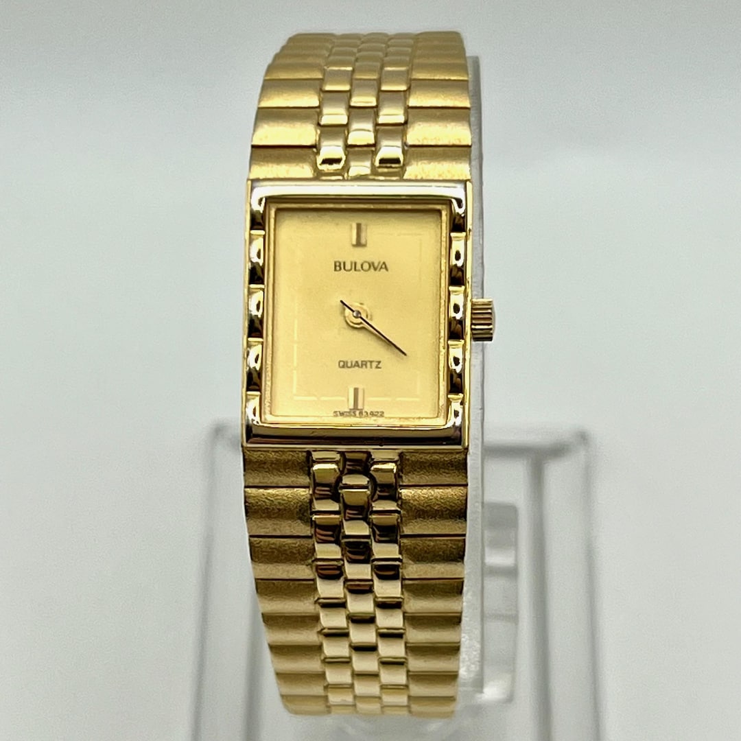 Vintage 90s Bulova ladies 97T05 gold tone bangle bracelet watch NEW BATTERY Champagne Dial Stainless Steel Bracelet Goddess of Time  main image 4
