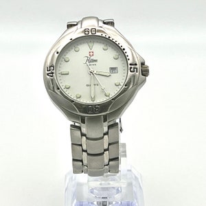 Hilton Vintage 90's Swiss Made Silver and White Unisex Watch Working