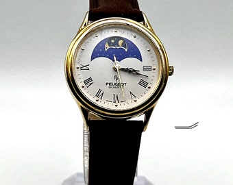 Vintage Peugeot maanfase goudkleurig bruin lederen unisex horloge werkend