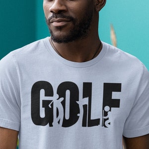 May include: A light blue t-shirt with a black graphic of the word "GOLF" with stick figures representing the different parts of the word.