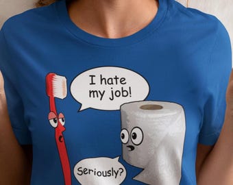 May include: A blue t-shirt with a cartoon toothbrush and toilet paper. The toothbrush says "I hate my job!" and the toilet paper says "Seriously?"