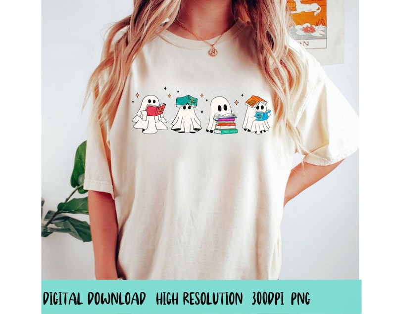 May include: A white t-shirt with a graphic of four ghosts reading books. The ghosts are wearing hats and holding books. The text "Bookish Ghosts" is printed on the shirt.