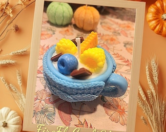 Vela de taza de bayas