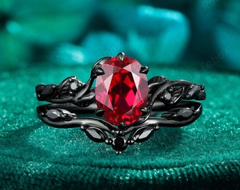 Gothic Oval Cut Ruby Engagement Ring Set, Rhodium Black Gold Red Ruby Bridal Set, Black Moissanite Witchy Promise Wedding Ring for Women