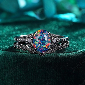 Gothic Black Fire Opal Bridal Set,Oval Facet Black Opal Engagement Ring Set,Rhodium Black Gold Black Moissanite Promise Wedding Ring for Her