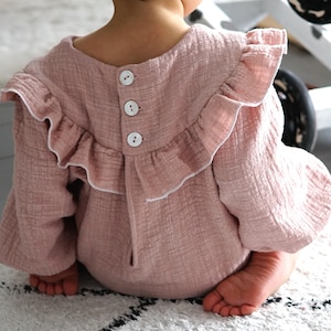 Ruffled jumpsuit with long puff sleeves made of embroidered muslin in many colors for babies and toddlers