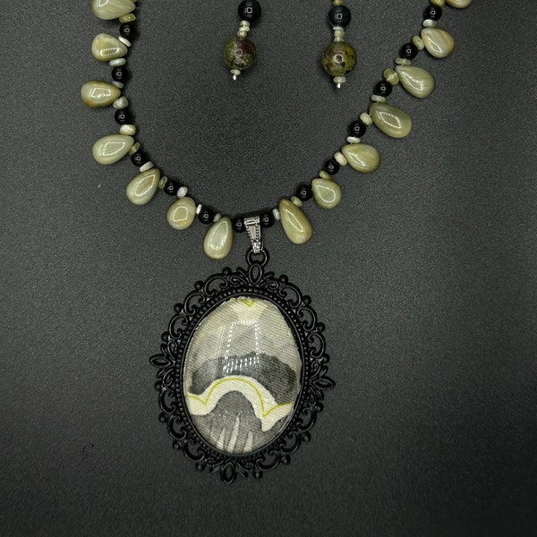 Necklace and earring set: Funky olive and grey cloth pendant with chrysoberyl cat's eye, moss agate, dragon blood, and onyx gemstones