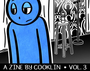 May include: A comic book cover with the title "ANHECOMICS" and the subtitle "COMICS ABOUT FEELING BLUE." A blue figure with a sad expression is on the left. A microphone and stool are on the right. The text "A ZINE BY COOKLIN • VOL. 3" is at the bottom.