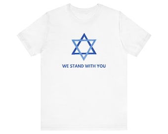 May include: White t-shirt with a blue Star of David and the text "WE STAND WITH YOU" printed on the front.