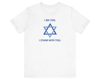 May include: White t-shirt with a blue Star of David and the text "I see you. I stand with you."