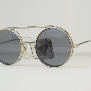 May include: A handmade wooden sign with the text "Welcome" in a playful font. The sign features a distressed white background and a dark brown frame, perfect for a front door or entryway.