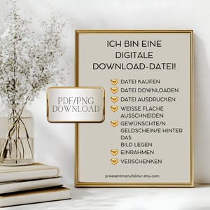 May include: A digital download file for a printable gift tag. The text on the tag reads "Ich bin eine digitale Download-Datei!" and lists the steps to use the file: "Datei kaufen", "Datei downloaden", "Datei ausdrucken", "Weisse Fl&auml;che ausschneiden", "Gew&uuml;nschte/n Geldschein/e hinter das Bild legen", "Einrahmen", "Verschenken". The text at the bottom of the tag reads "praesentmanufaktur.etsy.com".